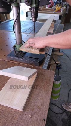 a person using a router to cut wood