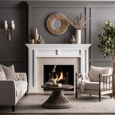 a living room filled with furniture and a fire place in front of a white fireplace