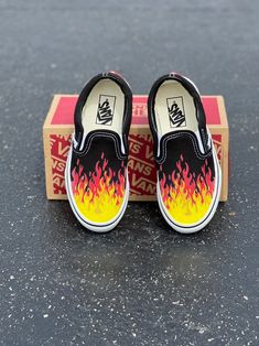 Red, orange, and yellow flame fire tip Slip On Vans Shoes.﻿ We buy each pair of shoes BRAND NEW. Each pair is made to order, please make sure you put in the correct shoe size before you check out. The ink is permanent and will never come off, fade away, or peel off. Made in the USA. This price includes everything: shoes and artwork. Each pair of shoes is made-to-order and takes 2-3 weeks to ship usually. Because the artwork is custom-made for you, there are no exchanges or returns. Please know Vans Painted Shoes Ideas, Flame Shoes, Vans Painted, Custom Shoes Men, Slip On Vans, Black Slip On Shoes, Black Slip On, Men's Vans, Custom Vans