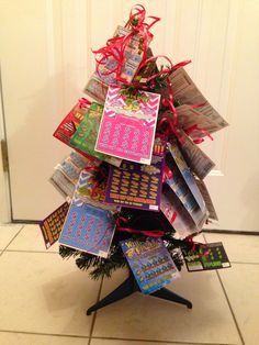 a small christmas tree made out of books