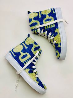 Ankara Silk Velvet High Tops | Elysian by Emily Morrison. Luxury Multicolor High-top Sneakers For Streetwear, Luxury Multicolor Lace-up High-top Sneakers, Multicolor Hand Painted High-top Sneakers, Luxury Ikat Print Art Silk Traditional Wear, Uzbek Ikat, Velvet Sneakers, Green Ikat, Sneakers Looks, Most Comfortable Shoes