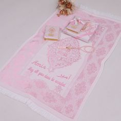 WE CAN WRITE ANY EXPRESSION (MAX 2 LINES) OF ANY LANGUAGE IN ANY THREAD COLOR ON ANYWHERE OF THE PRAYER MAT.HOW TO ORDER:- Select Set Option- Select Color- Select Quantity.- Write your personalization details into Personalization Box- Proceed to Checkout.OCCASIONSRamadan, Eid, Hajj Umrah, Wedding, Birthday, Mother's Day, Father's Day, Valentine's Day, Anniversary, GraduationDIMENSIONSPrayer Mat (27x51 inches)Quran (5x7 inches)Yaseen (5x6 inches)MATERIALSPolyester Prayer Mat, Velvet Quran, Pearl Prayer Mat Islam, Beautiful Hadith, Travel Prayer, Prayer Mat, Cardboard Gift Boxes, Muslim Prayer, Hadith Quotes, Custom Mats, The Prayer