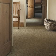 the hallway is clean and ready to be used for cleaning or carpeting in this house