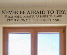 a wall decal that says never be afraid to try