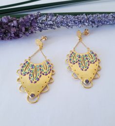 Lakshmi Earrings are made from Gold Plated Silver 925 with cotton thread and two smalls Amethyst Stone. Add elegant movement to your looks! These colorful earrings, are suitable for everyday use & any occasion. A great Gift For Her! * Details - Total dimension 5 cm - This listing is for one piece only. * Packaging You will receive it in a beautiful package ready for gift giving! * Shipping Ready to ship in 10-15 business days via Hellenic post with tracking number. *For longer life of jewelry, a Lakshmi Earrings, Romantic Earrings, Dangle Earrings Boho, Boho Style Earrings, Earring Dangle, Earrings Bohemian, Colorful Earrings, Earrings Boho, Boho Stil