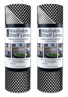 two rolls of washable shelf liners with black polka dots on the sides and white trim