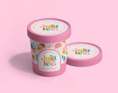 two pink ice cream containers with the words just ice on them against a pink background