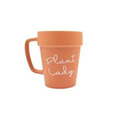 an orange cup with the words plant lady written on it, in white lettering that says plant lady