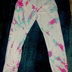 **Men’s Authentic Amiri Tie-Dye Sweatpants - Xl** Elevate Your Streetwear Game With These Luxurious Xl Amiri Tie-Dye Sweatpants, Where Comfort Meets High Fashion. Crafted From Premium Cotton, These Sweatpants Feature A Striking Tie-Dye Pattern That Effortlessly Blends Vibrant Hues For A Unique And Eye-Catching Aesthetic. The Relaxed Fit Ensures All-Day Comfort, While The Elasticated Waistband And Cuffs Provide A Tailored Silhouette That Flatters Any Body Type. Whether You're Lounging At Home Or Amiri Pants, Tie Dye Sweatpants, Cotton Sweatpants, Tie Dye Patterns, Laid Back Style, Body Types, High Fashion, Mens Pants, Tie Dye