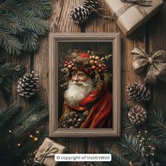 a painting of santa claus surrounded by pine cones and christmas presents on a wooden table