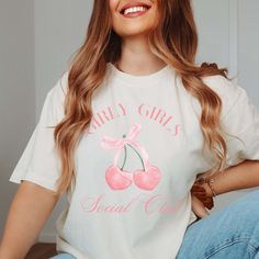 Dive into the world of femininity and fun with our Girly Girls Social Club Comfort Color Tee. This t-shirt is perfect for those who love to celebrate their girly side, filled with all things pink, sparkly, and fabulous. Showcasing a delightful design with the phrase "Girly Girls Social Club" in stylish lettering, this tee adds a playful touch to any wardrobe. Crafted with top-quality Comfort Color fabric, it promises exceptional softness and durability, keeping you comfortable throughout the day School Club Shirts, Girls Squad, Sweater Hat, Pink Sparkly, Los Angeles Style, Trendy Graphic Tees, Club Shirts, Comfort Colors Tee, Comfort Color