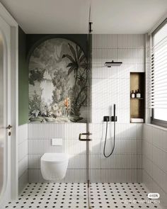 the bathroom is decorated in white and green tones with black and white tile flooring