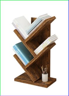 a wooden book shelf with books and pencils in it on top of a white background