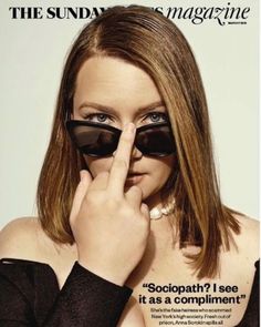 a woman in sunglasses covers her face with her hand on the cover of a magazine