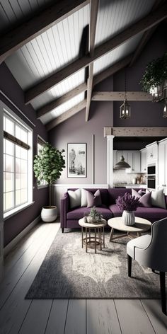 a living room with purple couches and white chairs on the hardwood floored floor