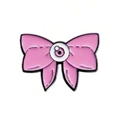 a pink bow with a button in the center on a white background for use as an applique