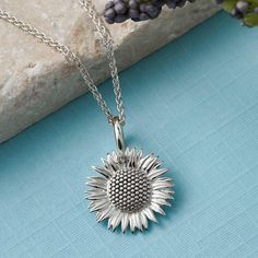 As seen at Chelsea Flower Show, discover our Sunflower Necklace For those who find joy in sunflowers, in the language of flowers, the sunflower means adoration, loyalty, and enduring longevity. These bold flowers exude happiness and the warmth of sunshine, making them a cherished emblem. Our exquisite Silver Sunflower Necklace is a perfect embodiment of this sentiment, and it's more than just jewellery; it's a heartfelt gift that carries deep meaning. 🌻 Crafted with Precision: Each Sunflower pe