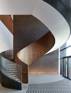 a spiral staircase in the middle of a building