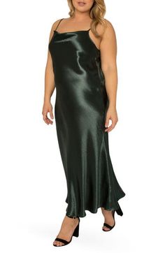 Textured satin shines with unparalleled elegance on this bias-cut slipdress that gracefully drapes your figure and flirtingly flutters around your ankles. 54" length Slips on over head Cowl neck Adjustable straps Unlined 65% Tencel® lyocell, 35% polyester Tencel lyocell is a sustainably produced fiber made with closed-loop processing Machine wash, tumble dry Imported Women's Clothing Slip Dress Outfit Winter, Silk Cowl Neck Dress, Slip Dress Outfit, Dresses Materials, Forest Green Dresses, Winter Dress Outfits, Midi Slip Dress, Maxi Slip Dress, Satin Slip