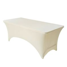 a white table cover with curved edges