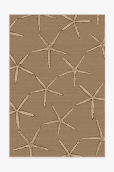 a brown and beige wallpaper with starfishs on the bottom, in an abstract pattern