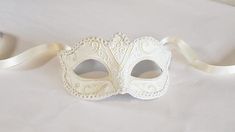 White masquerade mask women with white trim and glitter, simple elegant venetian mask for parties and weddings C U S T O M I Z A T I O N - This mask can be customized with color feather and mask base color! Pick the custom color option and leave a check out note. S H I P P I N G - Processed same White Masquerade Mask, White Masquerade, Masquerade Mask Women, Elegant Face Mask, The Mask Costume, Thank You Wishes, Masquerade Masks, Venetian Mask, Lowbrow Art