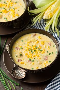 two bowls filled with corn chowee on top of a table