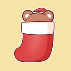 a red christmas sock with a teddy bear sticking out of it's top, on a yellow background