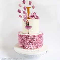 a three tiered cake decorated with pink flowers and a figure on the top layer