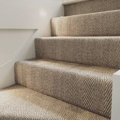 a close up view of some carpeted stairs