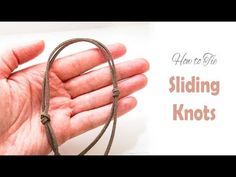 a hand holding a string with the words how to tie a sliding knot