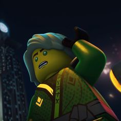 the lego movie character is holding an umbrella in front of a cityscape at night