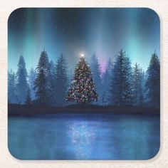 a christmas tree is lit up in the night sky with aurora lights beverage coasters