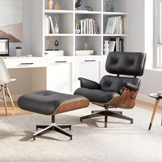 an eames chair and ottoman sit in front of a bookcase