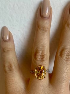 Metal: 14kt Yellow Gold Weight Of Ring Including Stones: 2.97 grams Stone: Citrine And Diamond Shape: Round And Oval-shape Diamond Weight: .08 ctw Rhodolite Weight: 4.25 ctw Measurements Of Rhodolite: 15.79 x 10.42 mm Ring Size: 6 Hight Of Ring: 23.00mm Width Of Band: 3.00 mm Design Element: Vintage infinity design. 1/2 Way Matching Band Listing: https://www.etsy.com/listing/576467063/any-color-14k-gold-vintage-style-diamond?ga_search_query=infinity&ref=shop_items_search_11 Eternity Matching Yellow Oval Topaz Ring In 14k Gold, Oval Yellow Sapphire Topaz Ring For Formal Occasions, Yellow Gold Oval Gemstone For Anniversary, Luxury Oval Yellow Gold Gemstones For Anniversary, Oval Yellow Gold Gemstones For Anniversary, Oval Yellow Topaz Ring In 14k Gold, Oval Yellow Gold Gemstones With Accent Stones, Classic Yellow Sapphire Oval Rings, Formal Oval Yellow Sapphire Rings