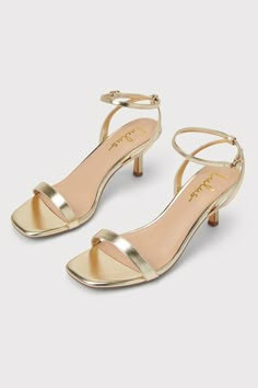 Stay comfortable and chic all through the day (and even into the evening) with the Lulus Ensley Gold Kitten Heel Ankle Strap Sandals! Shiny and smooth faux leather shapes these eye-catching heels that feature a single sole silhouette, a square toe bed, and a slender toe strap. Matching straps sprout from the sides to wrap and secure around the ankle with a gold buckle, all atop a super cute kitten heel! 2. 75" kitten heel. Cushioned insole. Rubber sole has nonskid markings. All Man Made Material Golden Short Heels, Prom Kitten Heels, Light Gold Heels, Short Gold Heels, Cute Short Heels, Gold Low Heels, One Inch Heels, Hoco Heels, Bama Rush