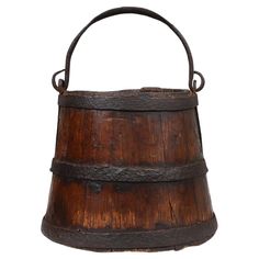 an old wooden bucket is shown on a white background