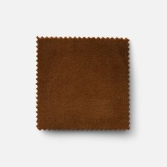 a brown fabric swatch on a white background