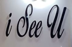 i see u sign on the wall in an office