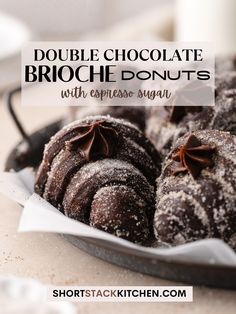 chocolate brioche donuts with cappuccino sugar are on a plate