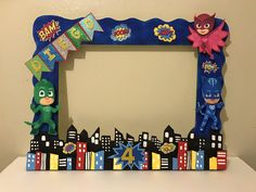 a photo frame decorated with an image of the incredible world of gump and pj masks