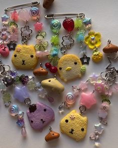 a bunch of charms that are sitting on a table