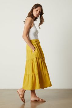 An essential if ever there was one. Crafted from our signature cotton gauze, this midi-to-maxi skirt can quite literally be styled to go anywhere–from work to vacation–with its easy tiers, elastic waist and always-essential in-seam pockets. Breezy Tiered Maxi Skirt, Chic Tiered Maxi Skirt For Summer, Breezy Ruffled Tiered Maxi Skirt, Breezy Tiered Maxi Skirt With Ruffles, Breezy Tiered Ruffle Maxi Skirt, Breezy Tiered Maxi Skirt For Summer, Tiered Maxi Skirt For Summer Day Out, Breezy Tiered Flowy Maxi Skirt, Breezy Tiered Lined Maxi Skirt