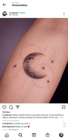 a small tattoo on the arm of a woman with stars and an moon in the sky