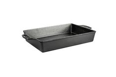 an empty black roasting pan on a white background