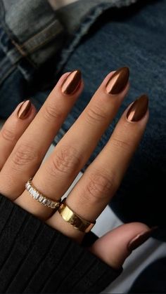 Get inspired with gorgeous fall nail designs that are perfect for both fall and winter seasons. Try these cozy colors and trendy patterns! #fallnails #winternaildesigns #fallnailtrends #winternails2024 November Gel X Nails, Winter Thanksgiving Nails, Fall Gelish Nails, Natural Trendy Nails, Pearly Brown Nails, Fall Gel Nails Chrome, Mocha Brown Chrome Nails, Bronze And Brown Nails, Call Brown Nails