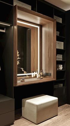 an image of a modern bathroom setting with mirrors and lights on the wall above the sink