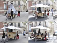 people are standing around in front of a small cart