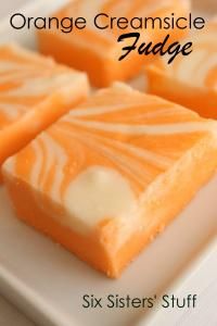 orange creamsice fudge on a white plate with the text six sisters stuff