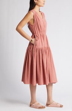 Drawstring ties cinch the waist of this gauzy cotton dress cut in a flowy, tiered silhouette that's perfect for a sunshine-filled day. 48" length (size Medium) Slips on over head V-neck Sleeveless Drawstring waist Unlined 100% cotton Machine wash, line dry Imported Pink Canyon, Cotton Gauze Dress, Muslin Dress, Gauze Dress, Daytime Dresses, Dress Sewing Pattern, House Dress, Dress Cuts, Waist Dress